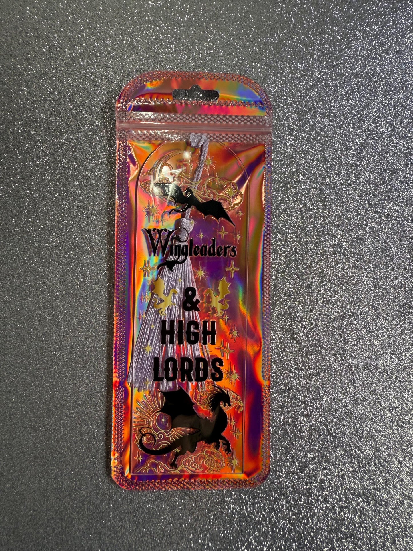 Packaged product with 'Wingleaders & High Lords' branding on a textured gray background