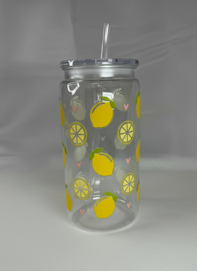 Clear tumbler with lemon pattern on a white background