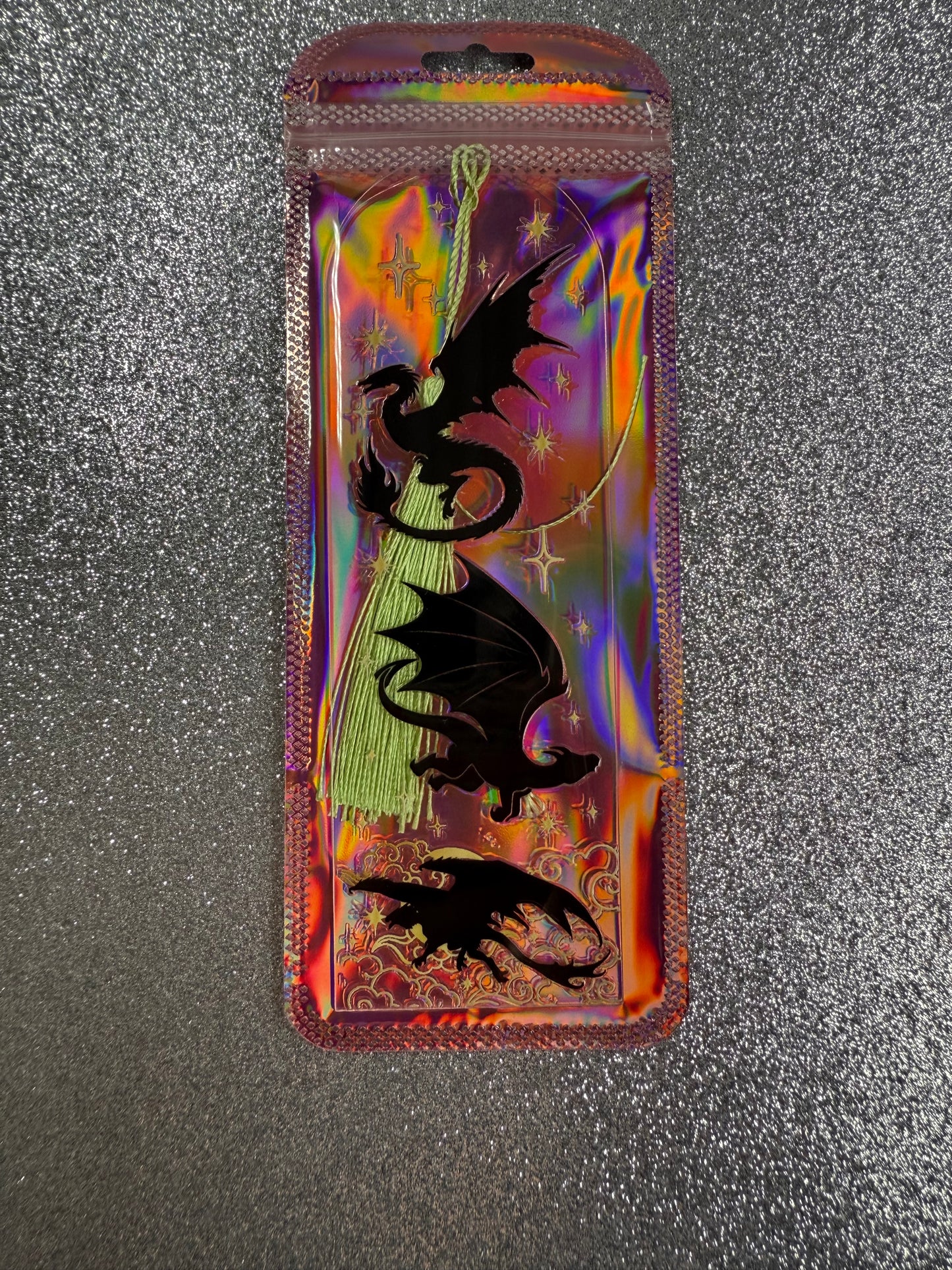 Holographic case with dragon design on a textured surface