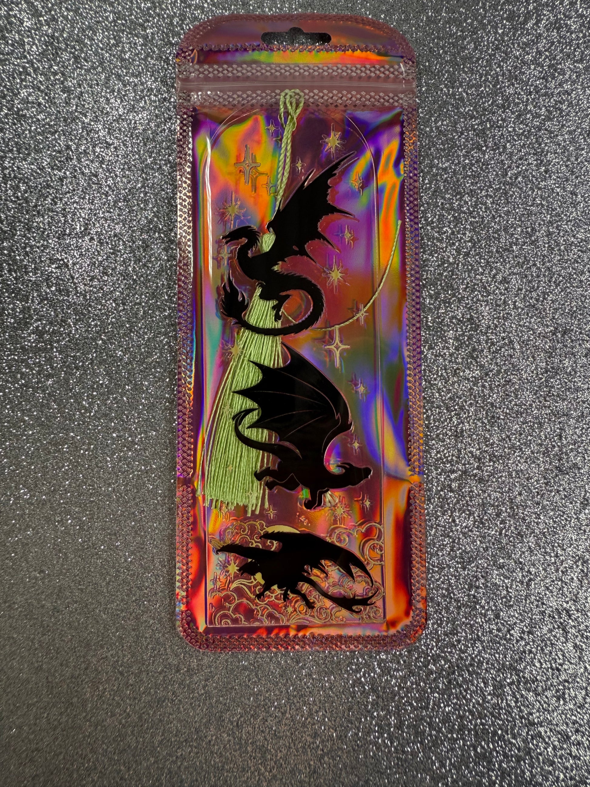 Holographic case with dragon design on a textured surface