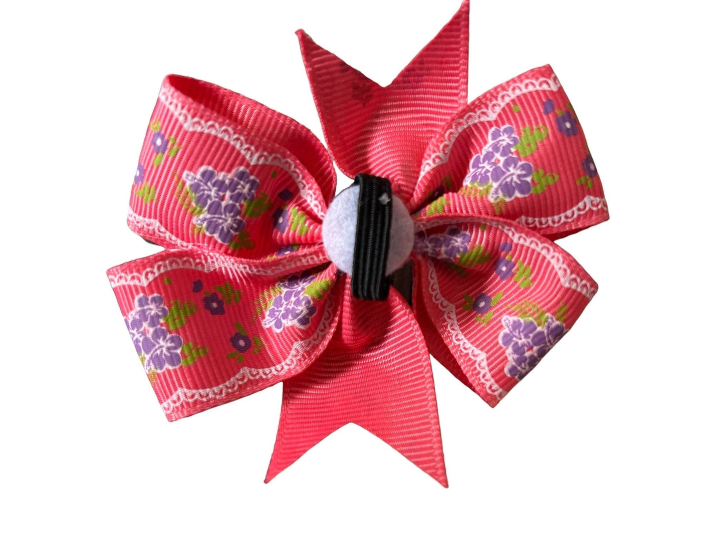 Red floral Dog bow with a white center on a white background
