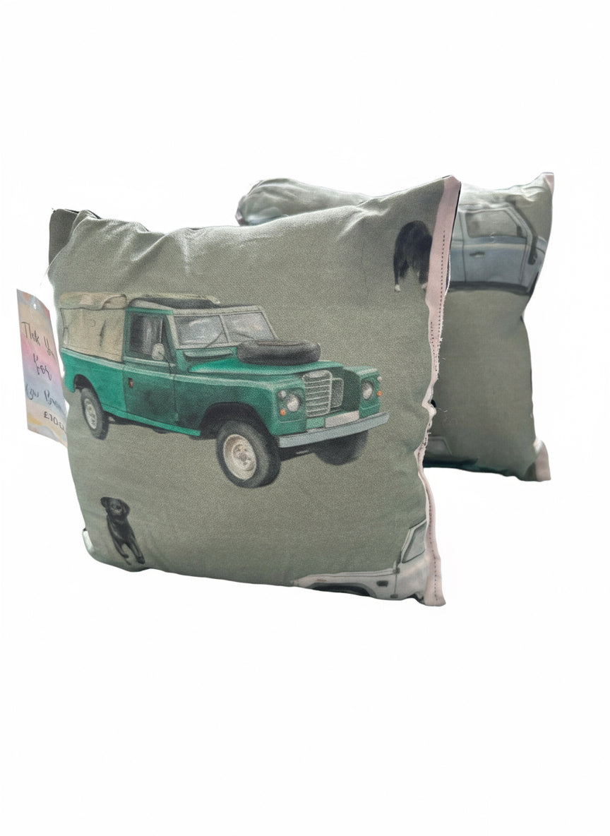 Pillow with a vintage truck design on a plain background