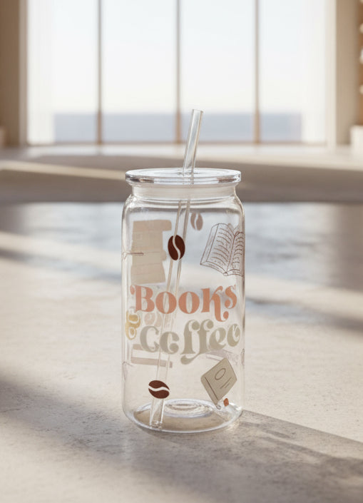 Clear tumbler with 'Books and Coffee' text and coffee bean designs on a dark surface.