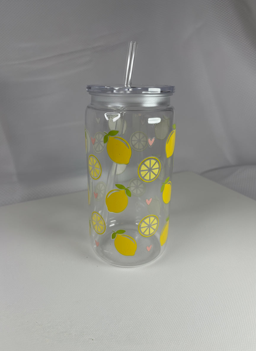 Clear tumbler with lemon pattern on a white background
